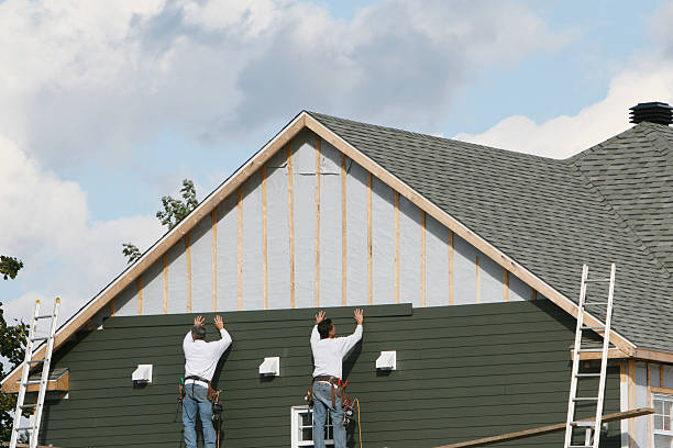 Professional Siding technician working in Warriors Mark, PA